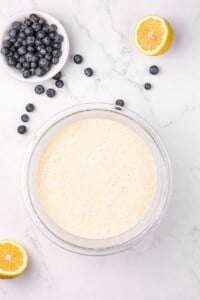 buttermilk pancake batter with lemons and blueberries.