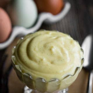 bowl of Vanilla Pudding with colorful eggs