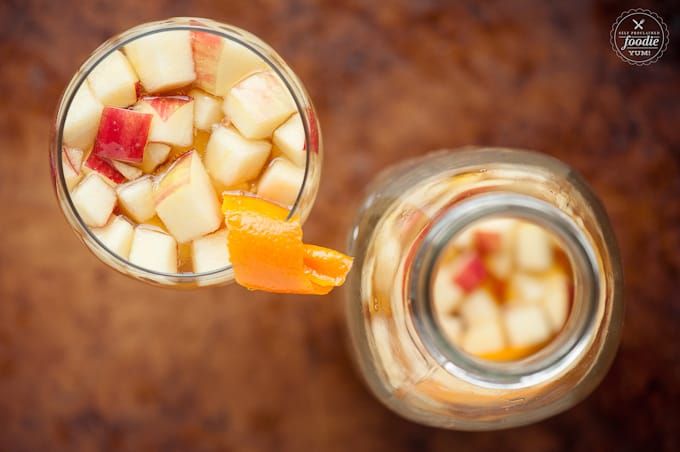 chopped apples in glass for cocktail