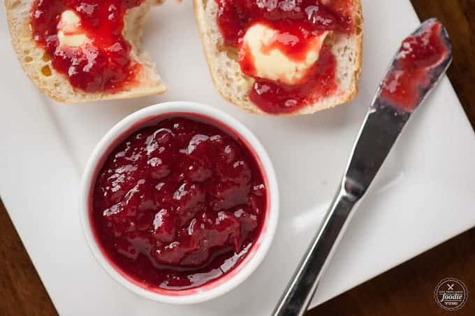 Strawberry rhubarb jam on biscuits for breakfast. Recipe and video.
