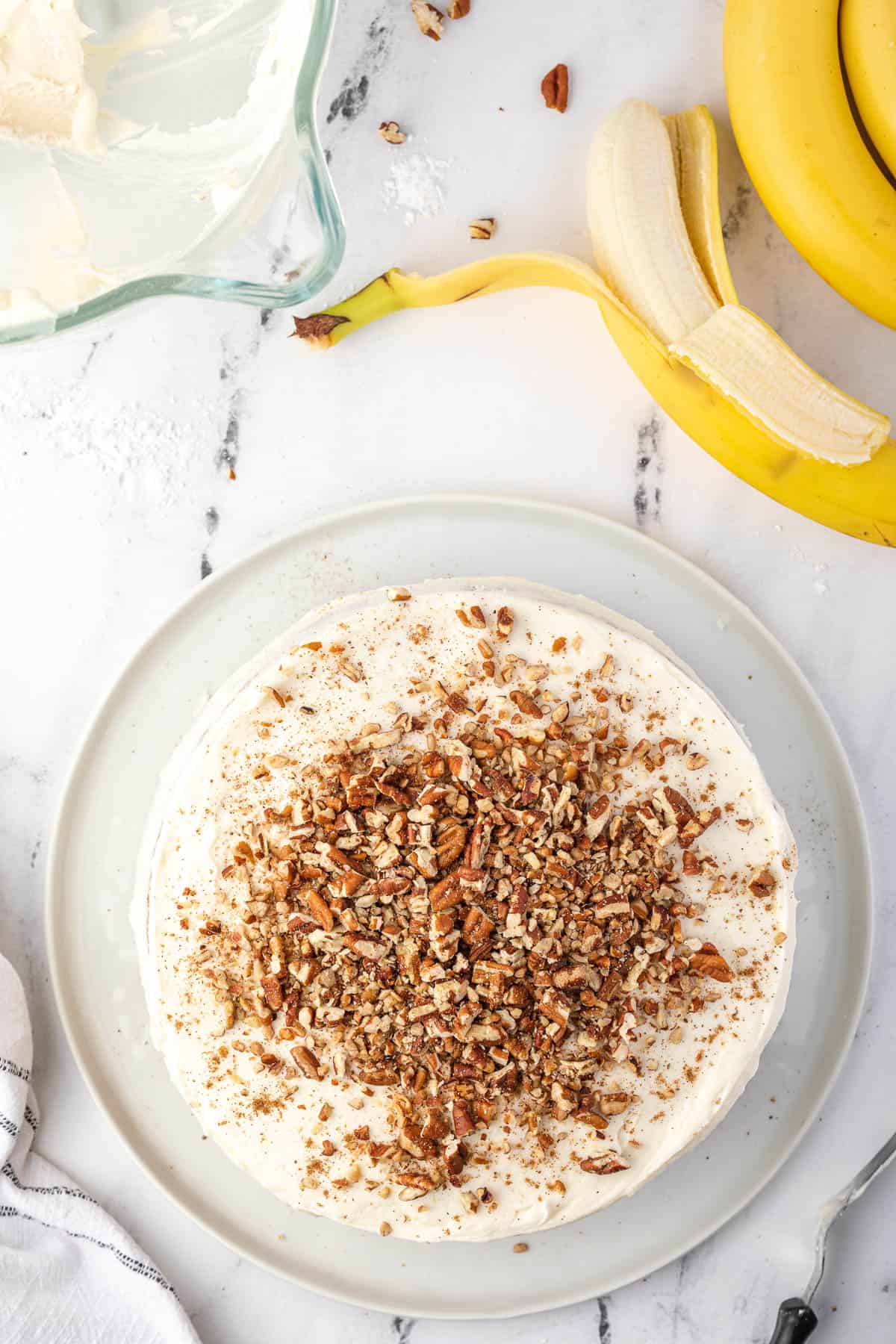 topping cake with nuts
