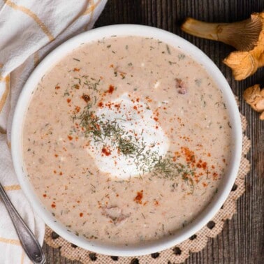 bowl of Hungarian Mushroom Soup topped with sour cream