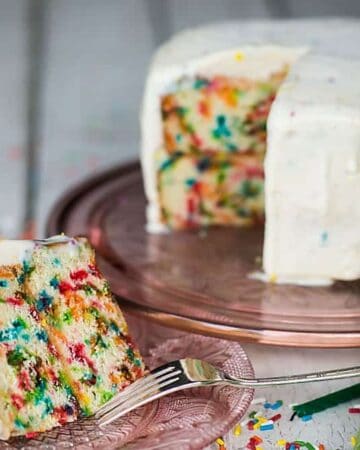 Ditch the frosting and enjoy this colorful Inside Out Birthday Ice Cream Cake made with homemade sprinkle filled cake and creamy birthday cake ice cream.
