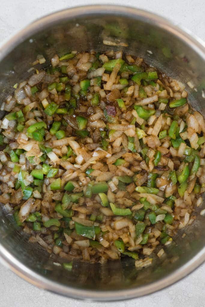 sautéed onions and peppers in bacon fat