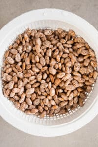 rinsed pinto beans in colander