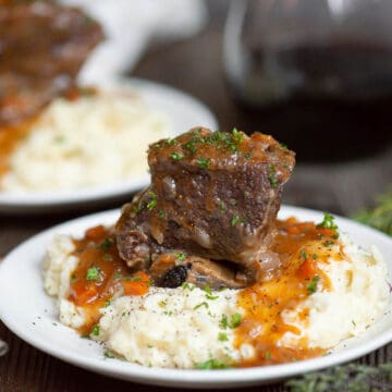 instant pot short ribs with gravy over mashed potatoes.