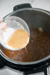 adding cornstarch slurry to gravy in instant pot.