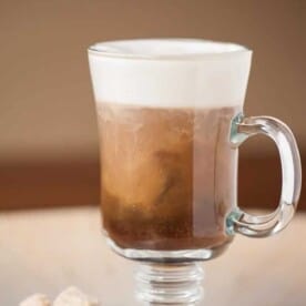 If you've never enjoyed an Irish Coffee, this delicious hot drink combines sweetened Irish whiskey and an Irish Cream whipped cream to standard coffee.