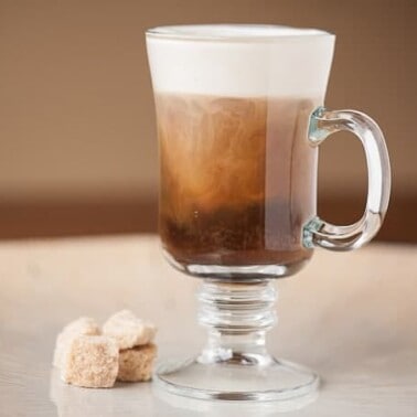 If you've never enjoyed an Irish Coffee, this delicious hot drink combines sweetened Irish whiskey and an Irish Cream whipped cream to standard coffee.