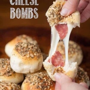 These Italian Cheese Bombs take only minutes to prepare using premade biscuit dough and the ooey gooey cheese and salami will be everyone's favorite.