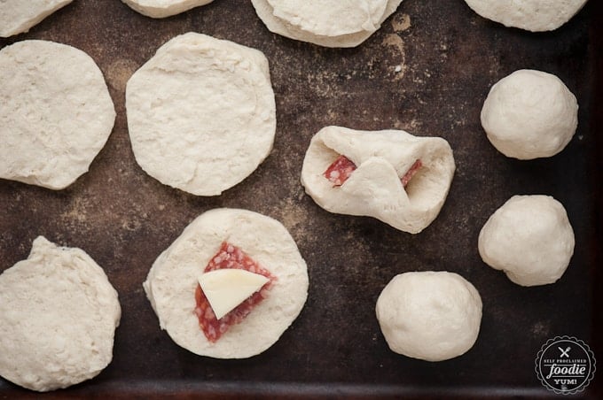 biscuit dough wrapped around salami and mozzarella
