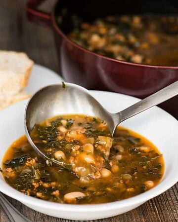 Italian Pork White Bean & Kale Soup is a hearty and healthy meal that is quick enough to serve as an easy weeknight dinner.