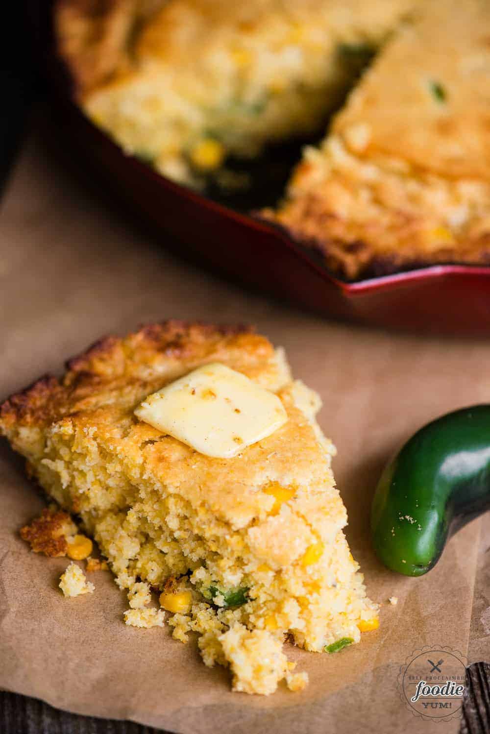 slice of jalapeno cornbread with butter on top