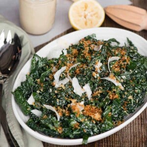 kale ceasar salad in white dish