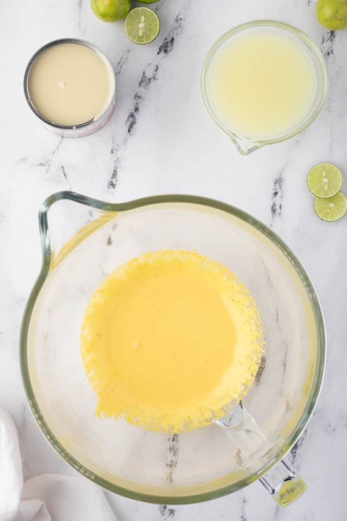 whisked egg yolks and lime zest