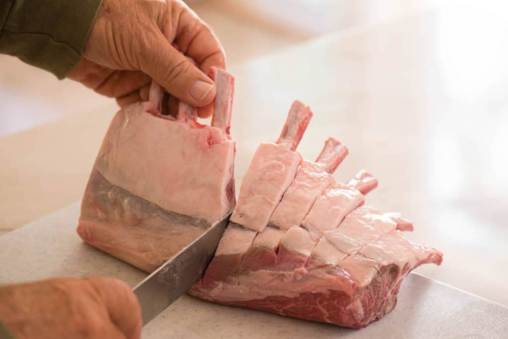 cutting rack of lamb in between bones