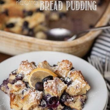 lemon blueberry ricotta bread pudding on a plate