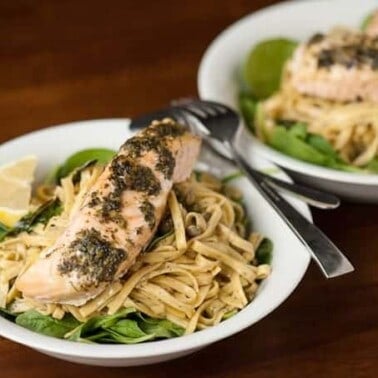 This incredibly easy to make and absolutely delicious Lemon Caper Pesto Salmon Pasta is a gourmet dinner ready in less than 25 minutes!