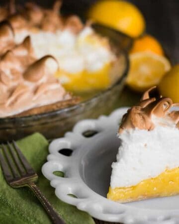 Lemon Meringue Pie is made with a flaky all-butter crust, a creamy and tart lemon filling, and a light meringue topping. It is a fantastic citrus dessert that is a real treat because it is a three-step recipe that takes time, care, and technique. The result is a mouth watering pie that looks and tastes amazing!