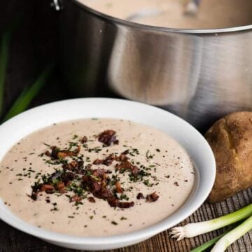Loaded Baked Potato Soup is a rich and creamy soup filled with everything the perfect loaded potato has. Crisp bacon, sour cream, grated cheddar cheese, green onions, and perfectly cooked baked potatoes. This is one of the best comfort food meals best enjoyed with a fresh green salad and hot crusty bread. Yum!