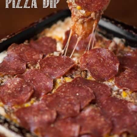 This sinful but incredibly delicious Loaded Cheesy Pizza Dip is simple to make and is the perfect game day appetizer to feed a hungry crowd!