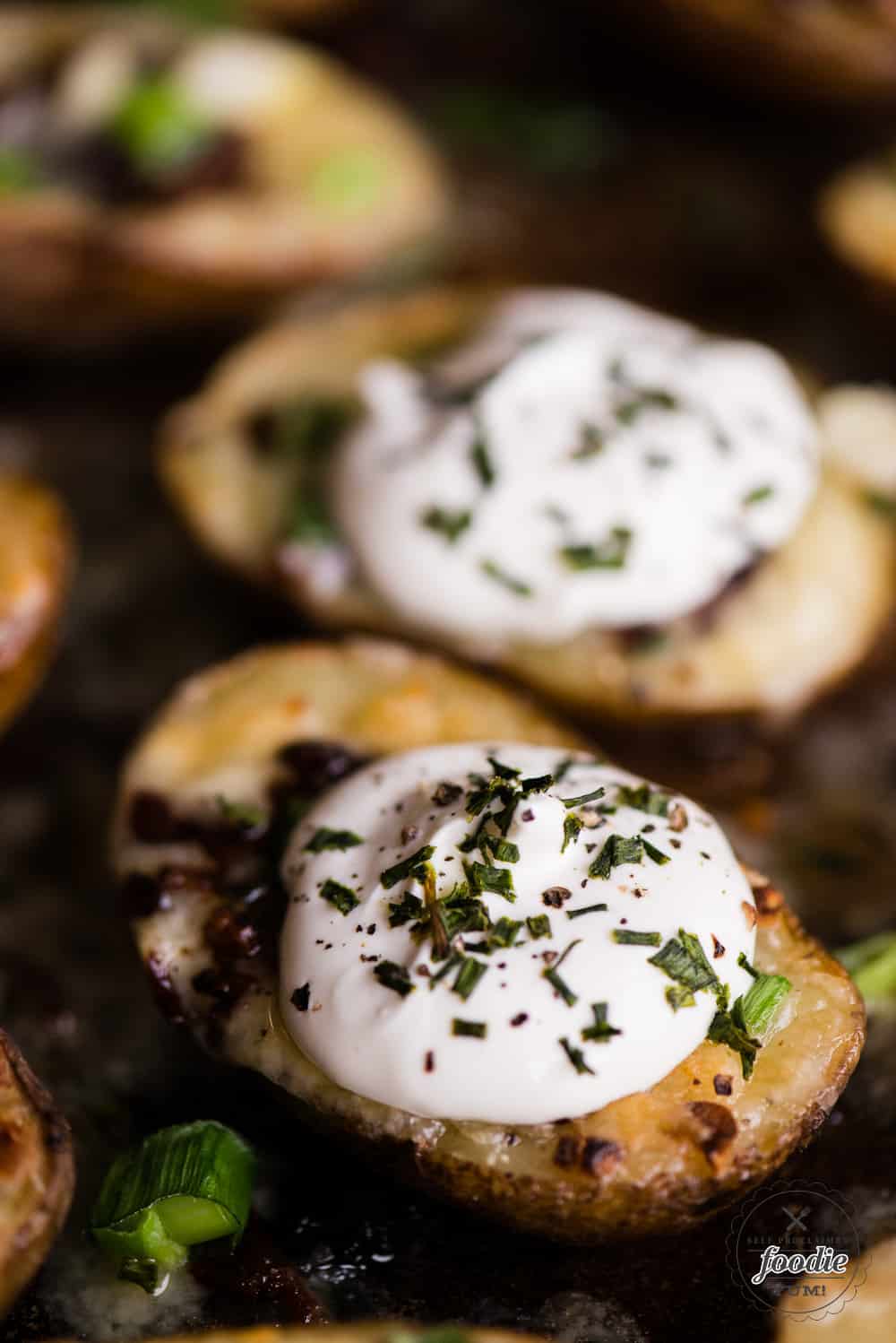 homemade potato skins topped with sour cream