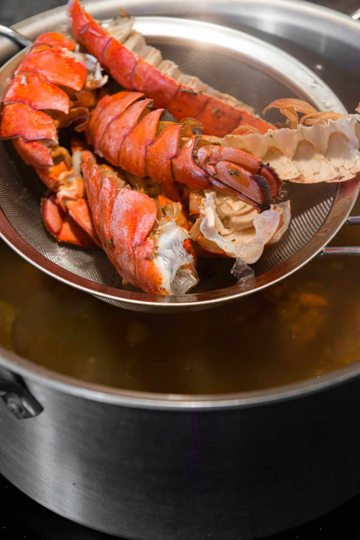 straining lobster stock