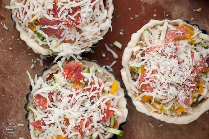 mini pizzas before being baked