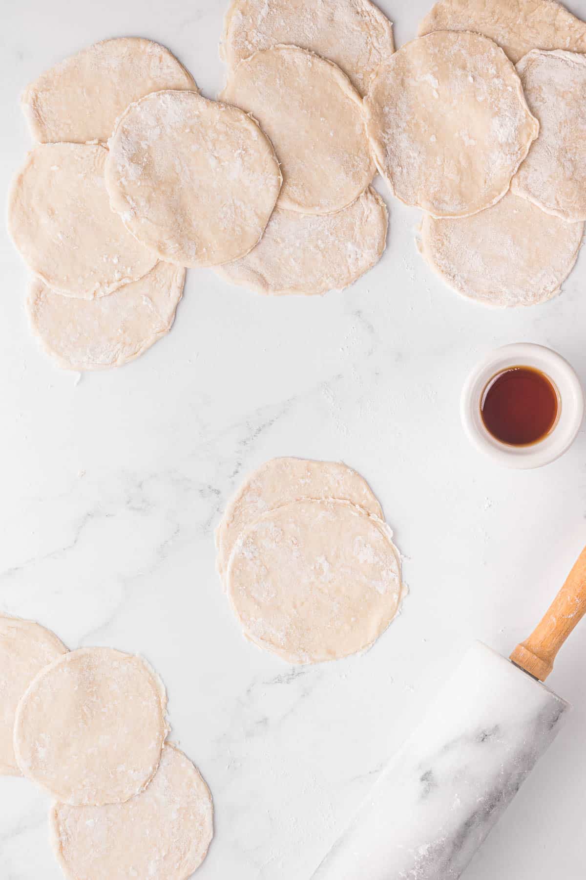 matching small circles of dough to make Mandarin pancakes.