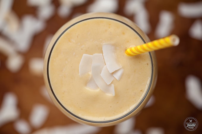 MANGO PINEAPPLE SMOOTHIE with coconut flakes