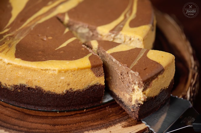 a slice of marbled chocolate pumpkin cheesecake