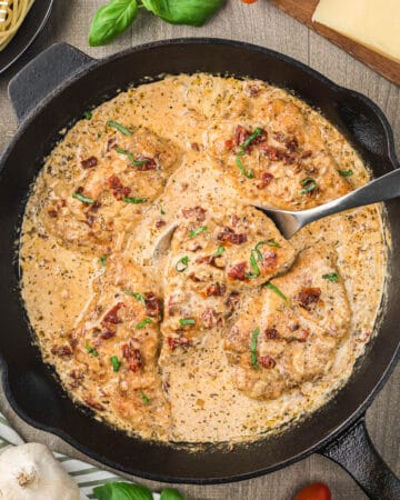 chicken breasts covered in sundried tomato cream sauce.