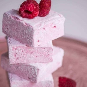 homemade raspberry marshmallows stacked on top of one another