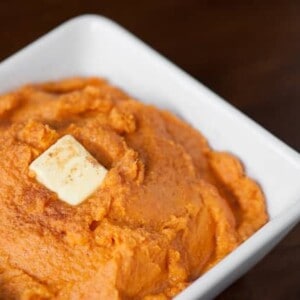 A side dish of Mashed Sweet Potatoes made with greek yogurt and a touch of brown sugar provide a tasty balance of complex carbohydrates, fiber, and protein.