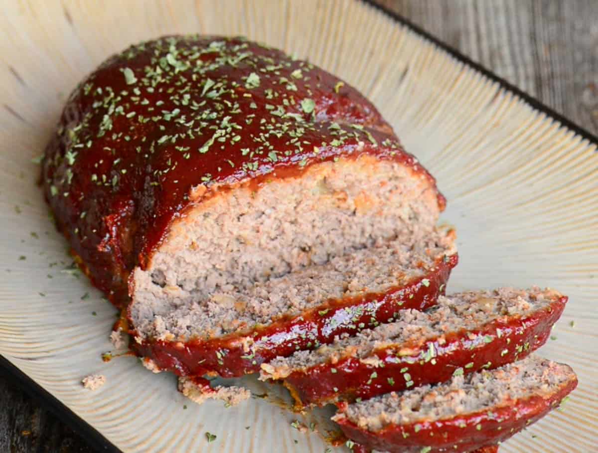 sliced meatloaf on platter.