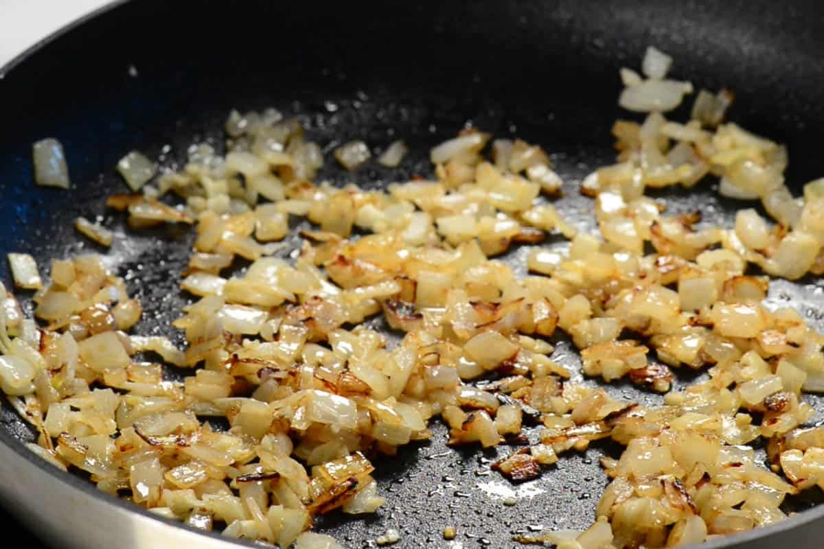 sauteed onions in pan.