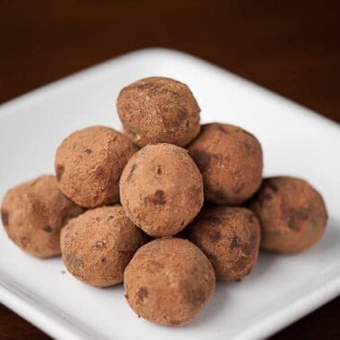 These Mexican Chocolate Truffles made with real Ceylon cinnamon, vanilla, and almond extract are easy to make and delicious bite sized holiday treats.
