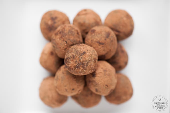 stack of cinnamon Chocolate truffles on white plate