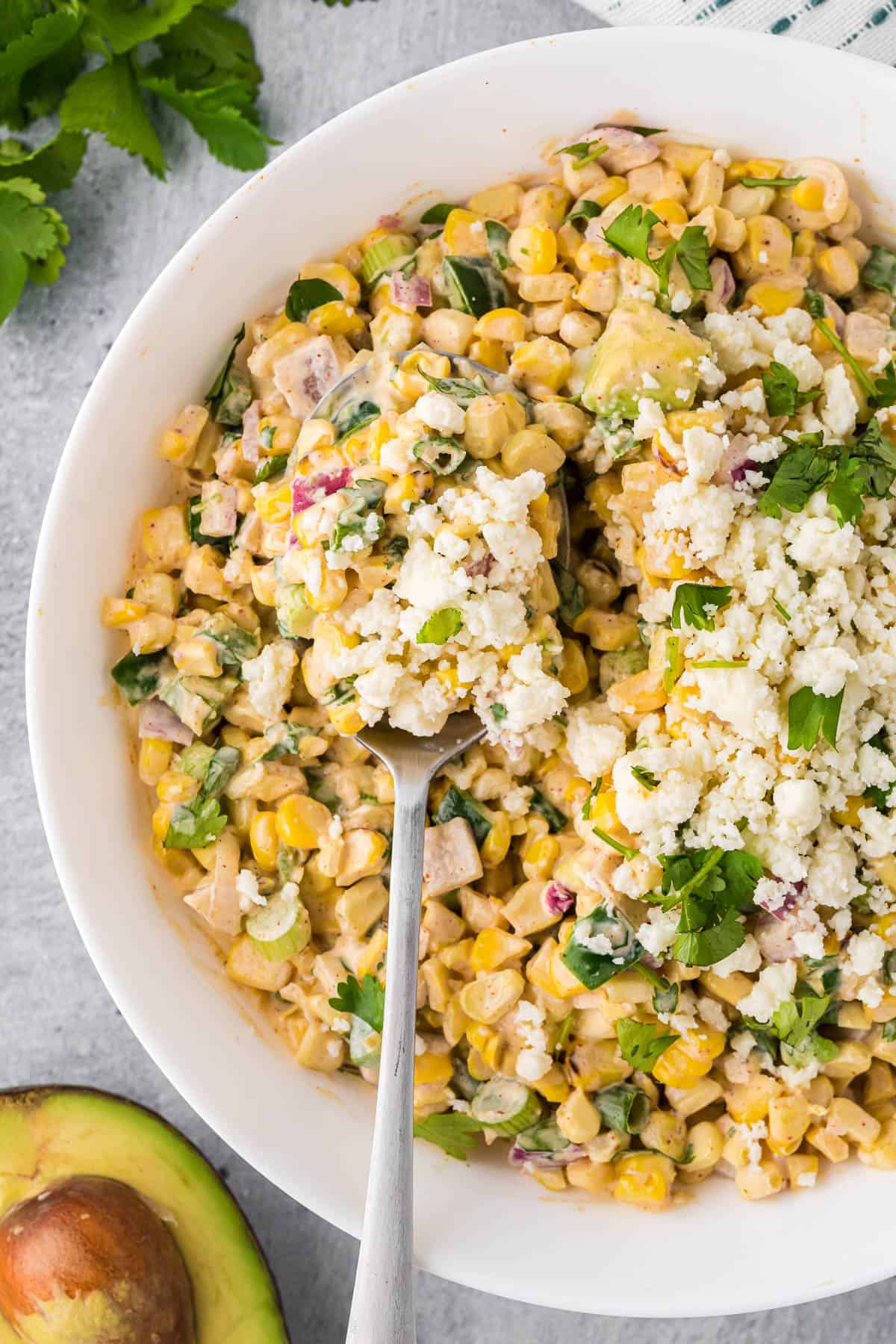 serving up some homemade Mexican street corn salad.