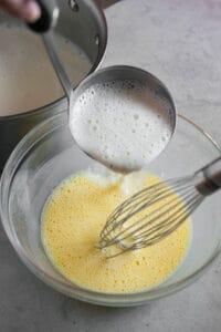 tempering egg yolks with scaled cream