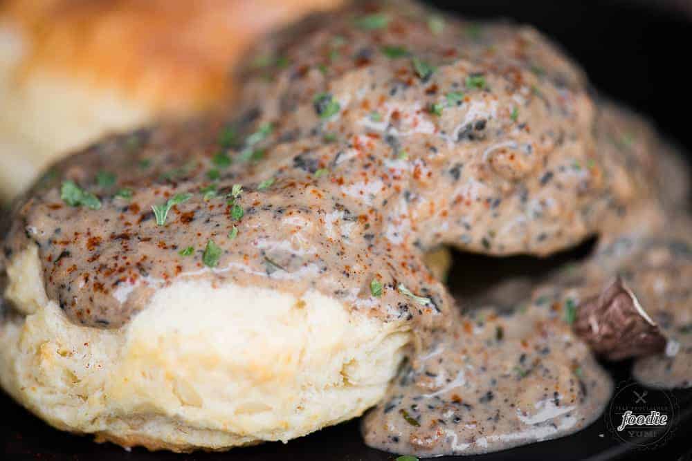 homemade flaky biscuits smothered in vegetarian country mushroom gravy