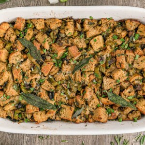 Thanksgiving wild mushroom stuffing in white casserole dish.