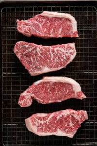 marbled New York Strip Steaks