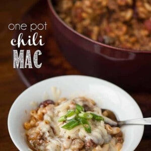 A bowl of Chili mac topped with cheese and green onions