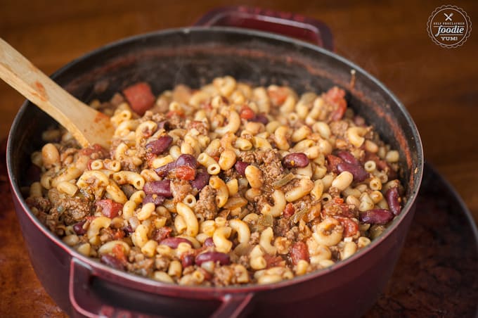 a pot of Chili mac with ground beef, beans, pasta, and tomatoes