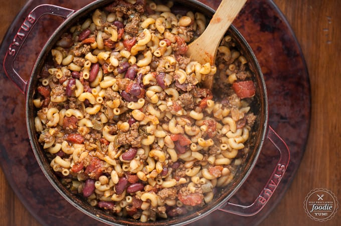 looking down at a dutch oven with homemade Chili mac 