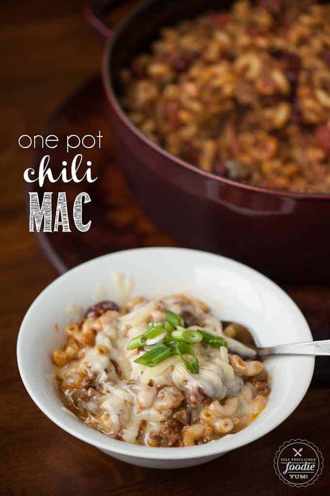 A bowl of Chili mac topped with cheese and green onions