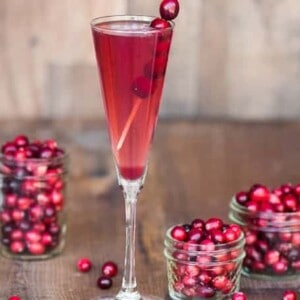 Orange Cranberry Prosecco is an easy single serving winter cocktail made from sweetened tart cranberry juice, orange liqueur, and Riondo Prosecco.