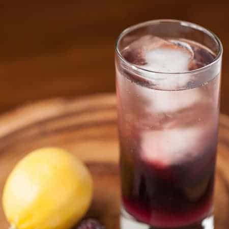 Oregon Blush is a delicious cocktail perfect for Valentine's Day made from marionberry infused vodka with lemon juice, simple syrup, and champagne.