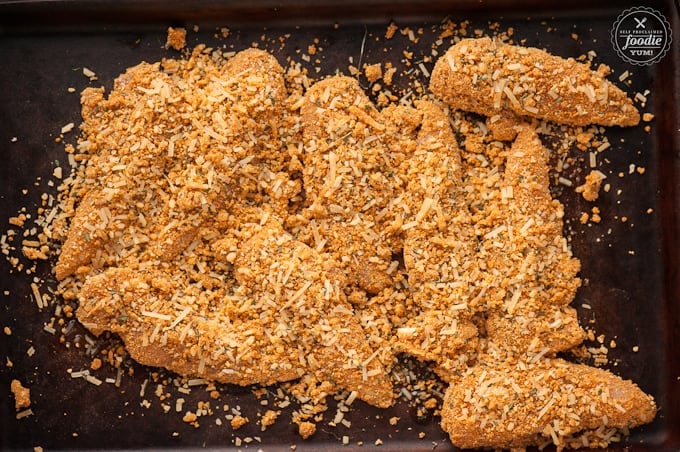 chicken tenders with crispy coating ready to be baked